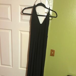 Elegant black dress with silver neck piece